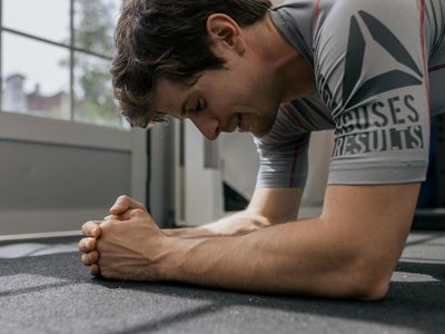 Athlete performing a plank exercise with perfect form.